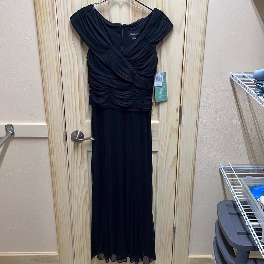 Black full length evening gown.